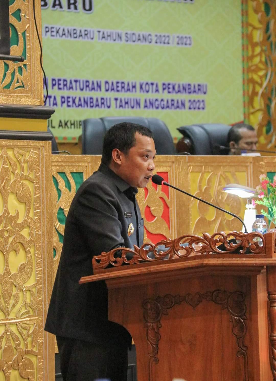 1672771635-OpiniRiau com-Pj Wali Kota Pekanbaru Muflihun menyampaikan Nota Keuangan APBD 2023 saat Rapat Paripurna di DPRD Pekanbaru